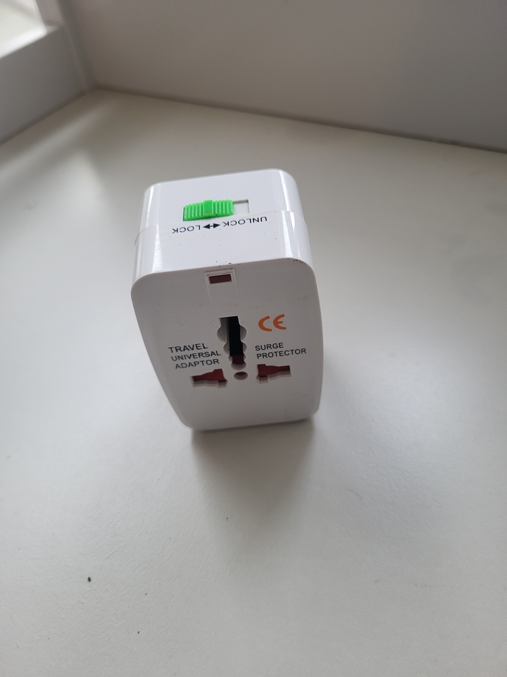 Universal Travel Power Adapter with Surge Protector - White